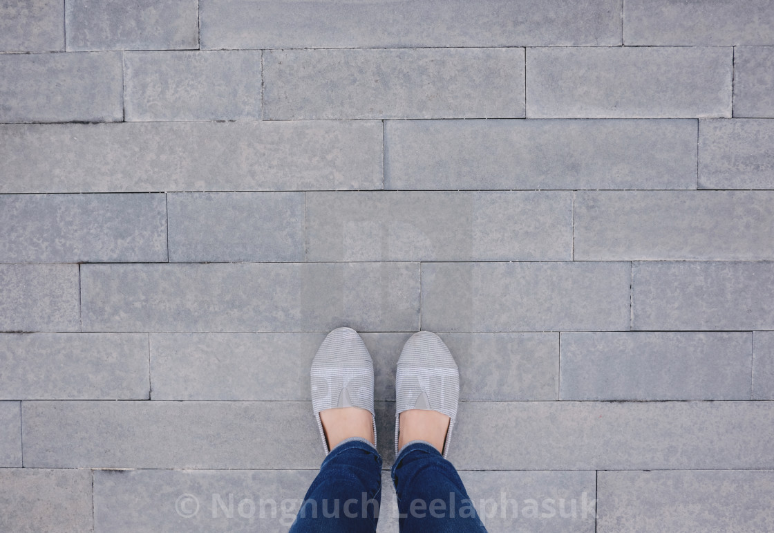 shoes on pavement